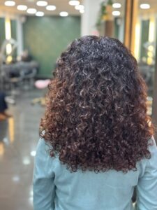 Curly hairdressers at Hair & The Hound Salon in Twickenham