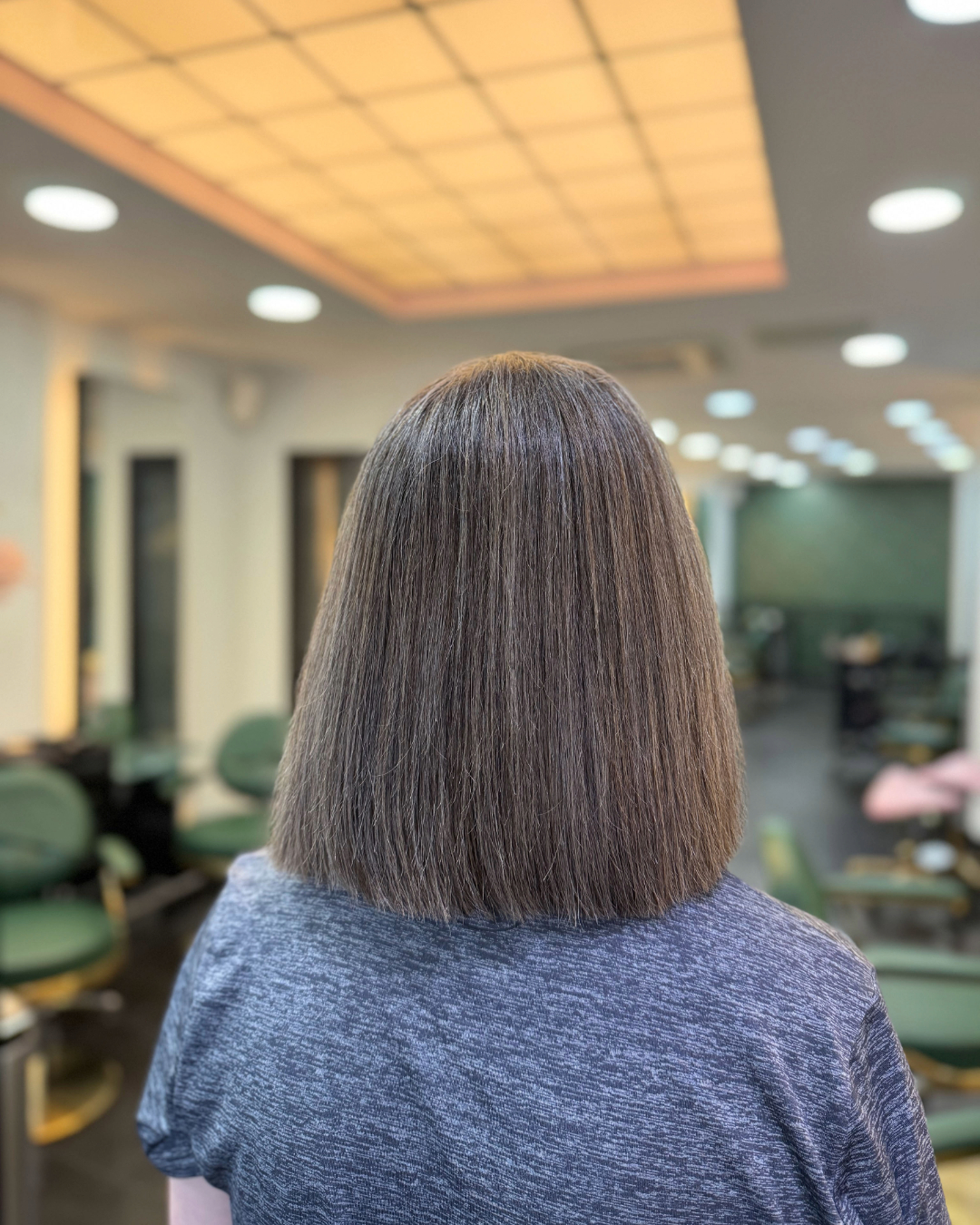 after a transitional grey hair colour at hair and the hounds salon